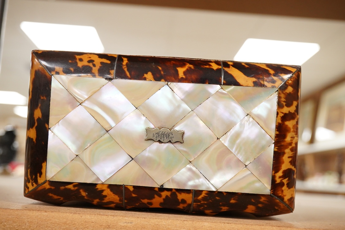 A mid 19th century decorative tortoiseshell and mother of pearl tea caddy, 20cm wide x 12.5cm high CITES Submission reference CXXC25Q1